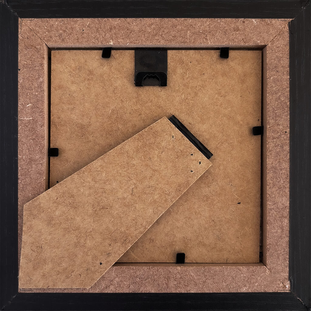 Back of a framed picture with hook and stand