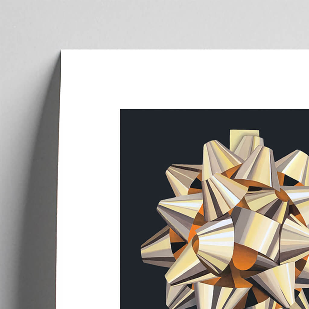 Giclée fine art print of a gold gift bow on a deep grey background. This image shows a section, to highlight the detail.