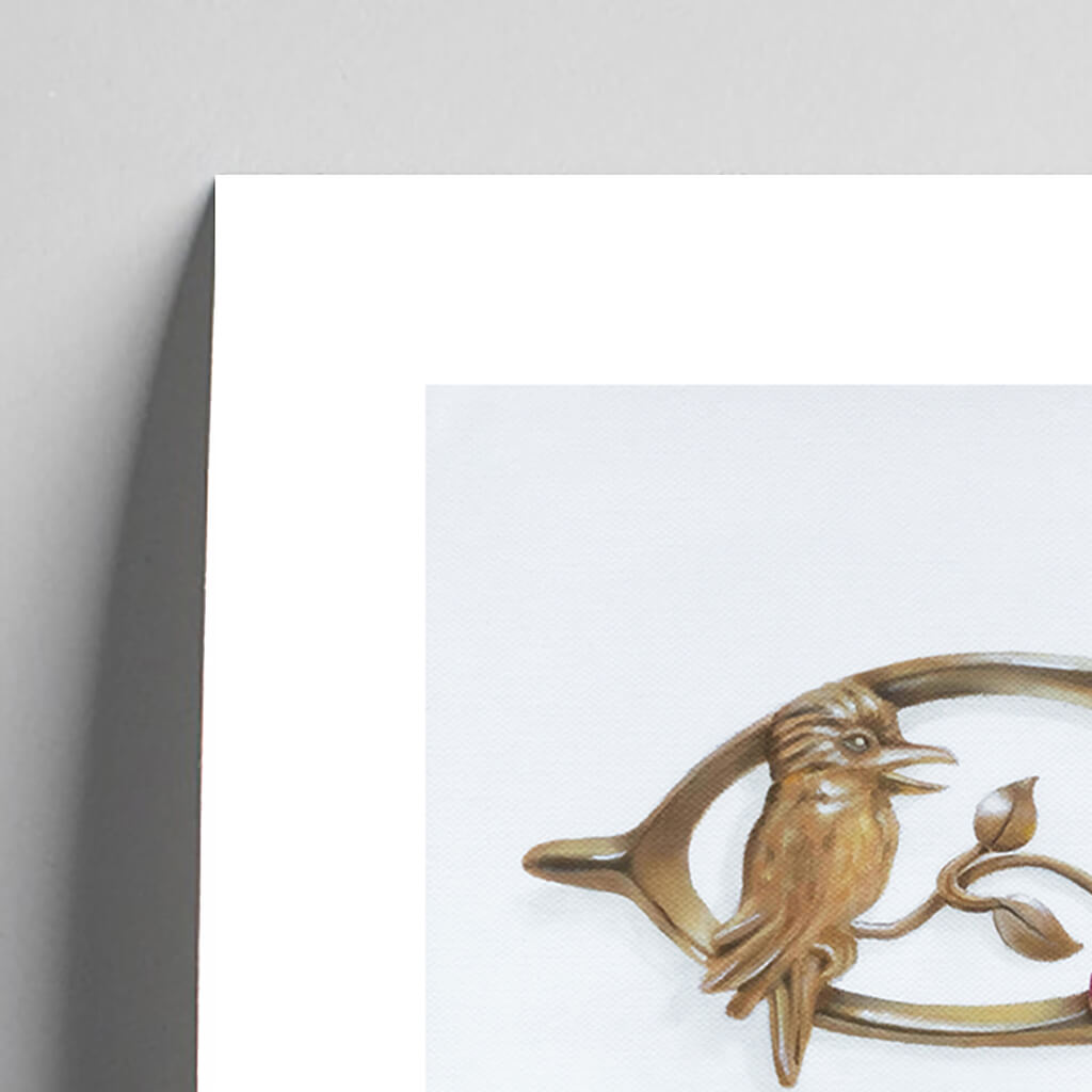 Giclée fine art print of an Australian gold kookaburra bird brooch on a pale grey background. This image shows a section, to highlight the detail.