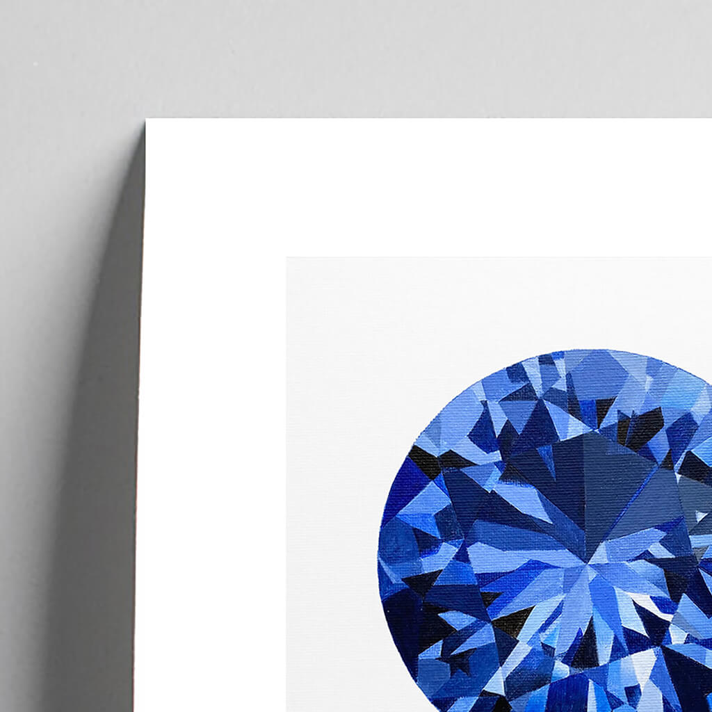 Giclée fine art print of a blue sapphire gemstone on a light grey background. This image shows a section, to highlight the detail.