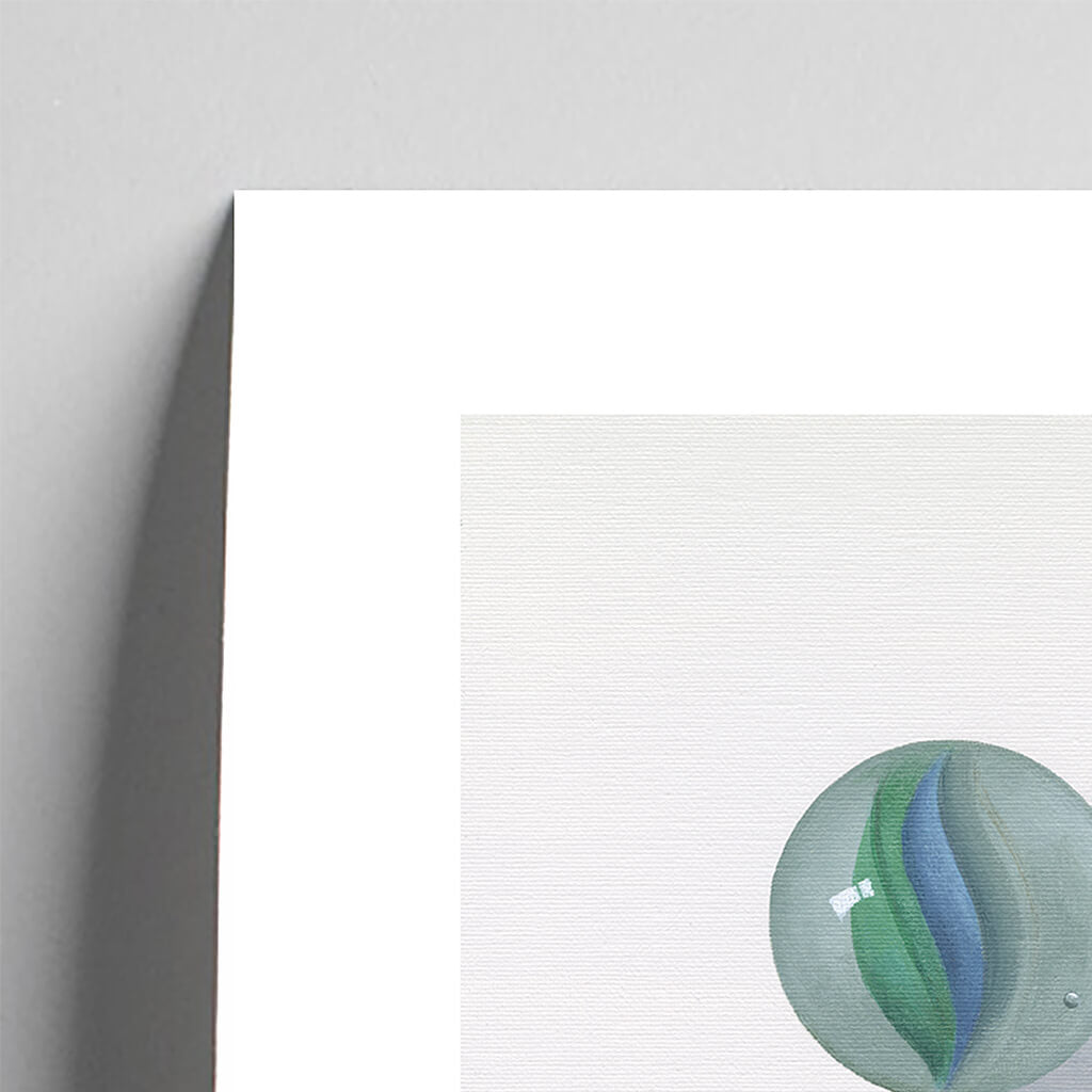 Giclée fine art print of a cat's eye marble on a pale grey background. This image shows a section, to highlight the detail.
