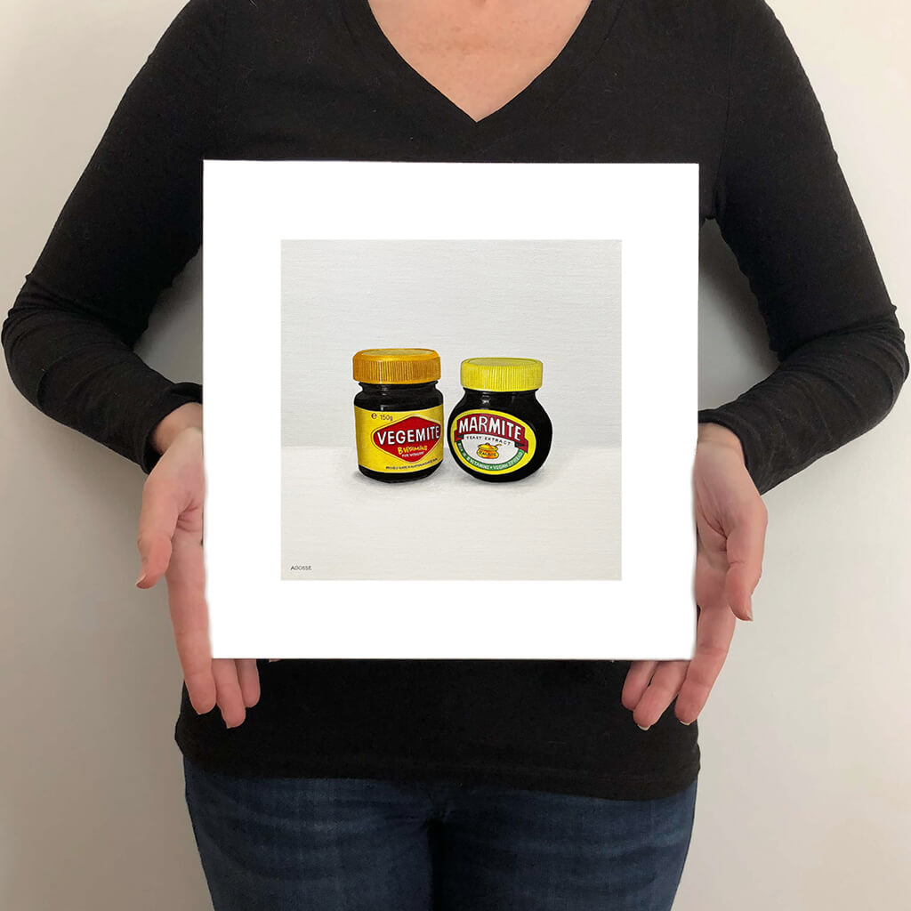 A giclée fine art print on paper of jars of spread on a light grey background. This image illustrates the print size.
