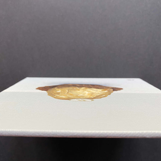 Miniature painting of a chocolate in gold foil acrylic on canvas board