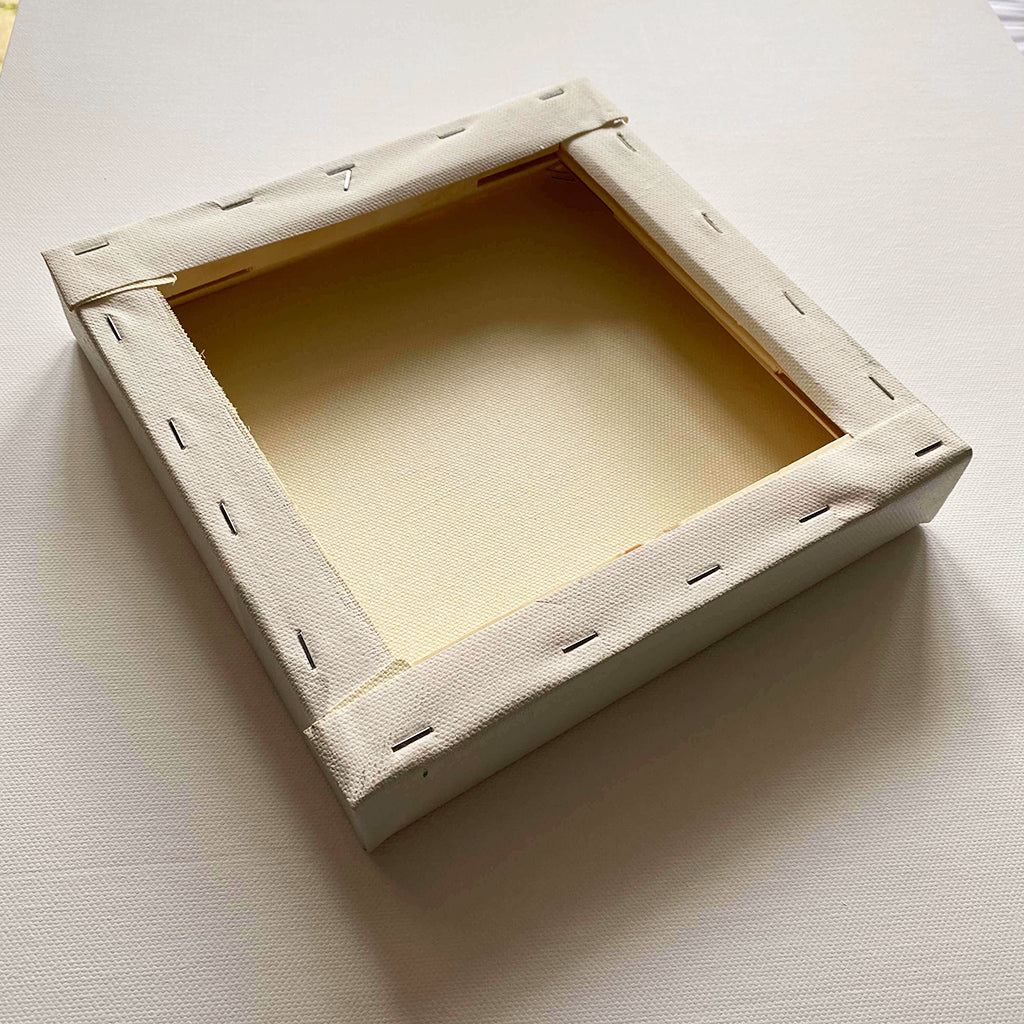 original realism acrylic painting of a yellow and red retro glass marble toy painted by Amanda Gosse back