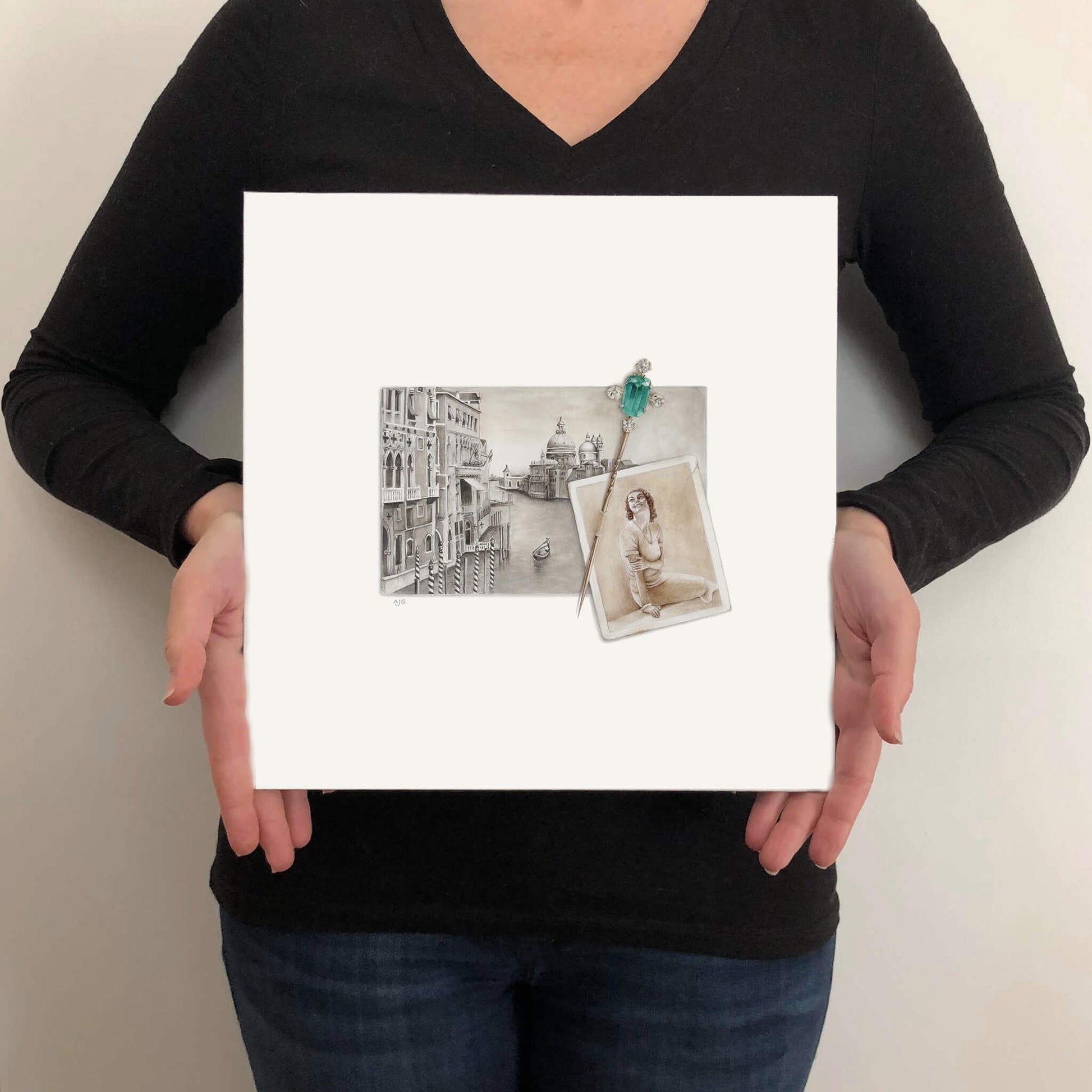Person holding an original painting of a Venetian canal with a building and a woman's portrait, with a jewelled antique stick pin.