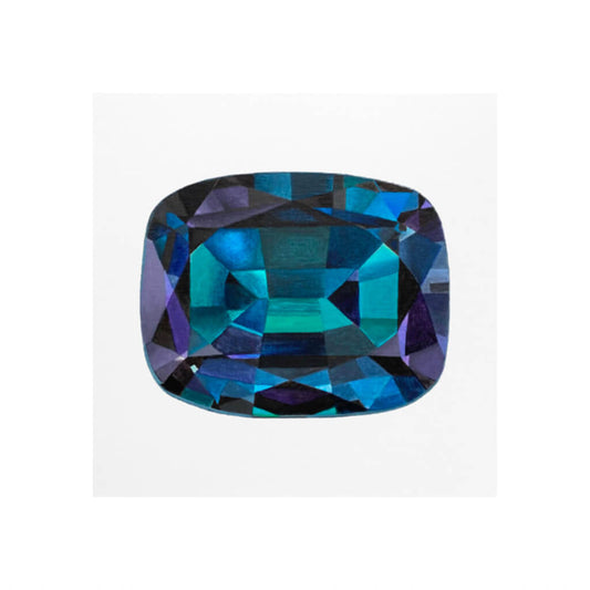 A giclée fine art print of an alexandrite jewel, rectangular in shape and blue, green and purple. The gemstone has a very pale stone background.