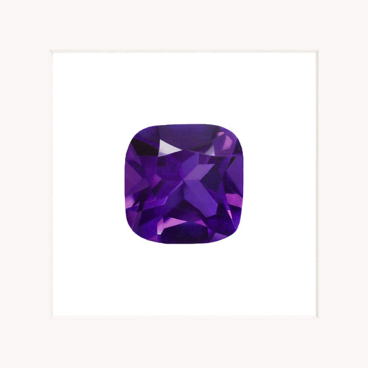 Purple gemstone on a white background