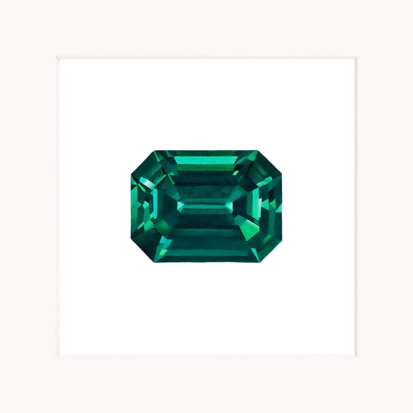 Emerald cut emerald gemstone on a white background