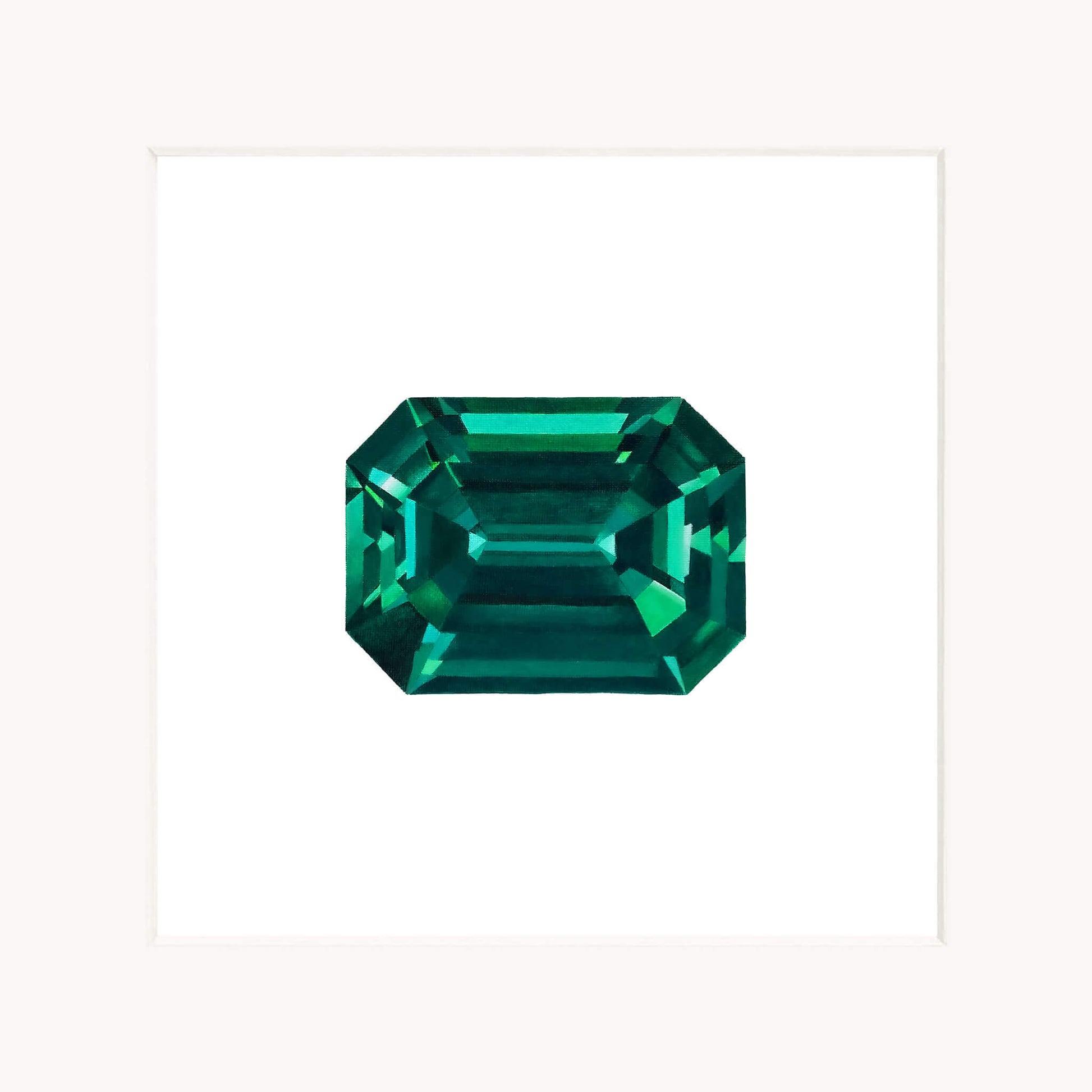 Emerald cut emerald gemstone on a white background