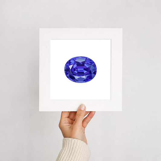 Hand holding a card with a blue gemstone on a light gray background