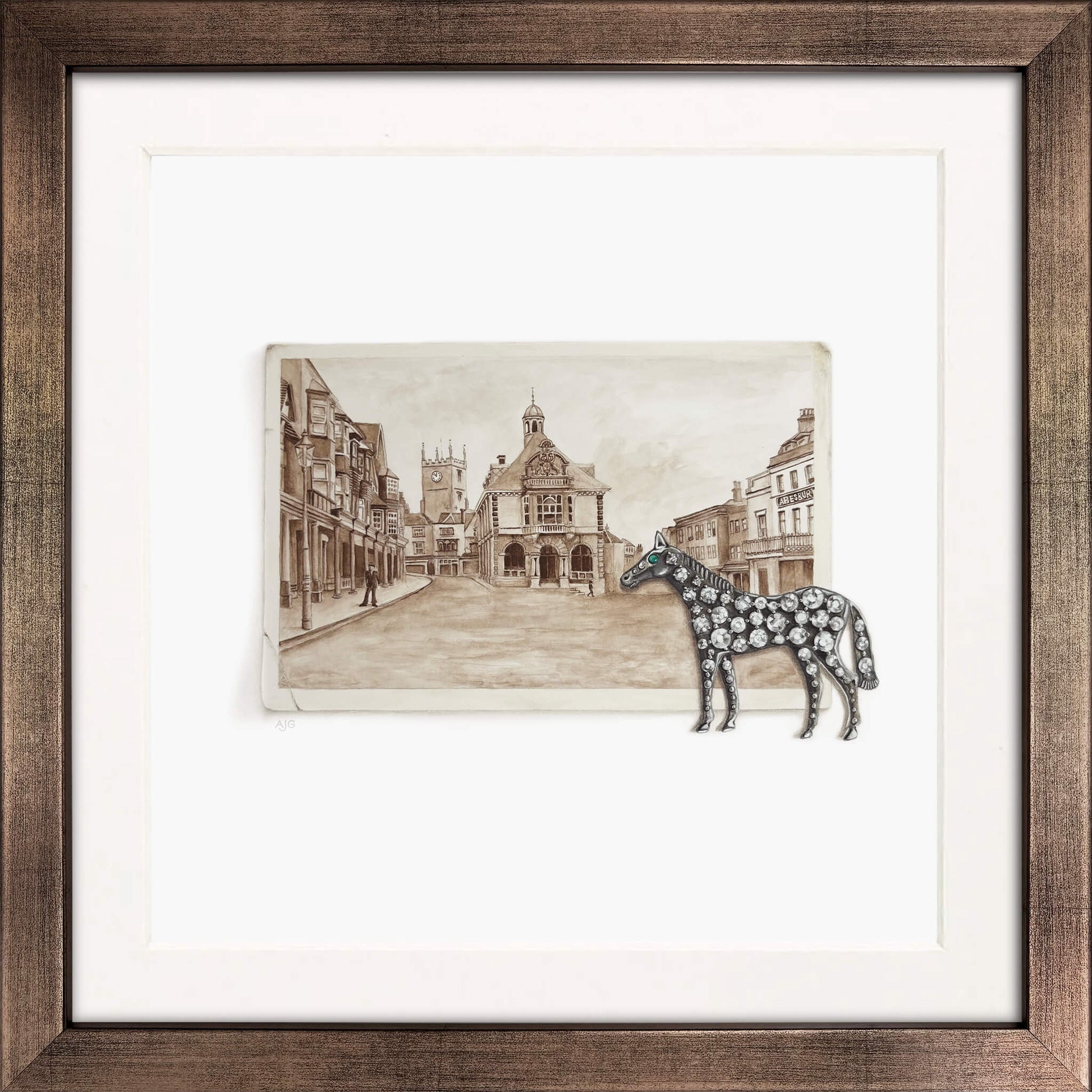Framed artwork with a diamond horse brooch and sepia street scene photo of Marlborough Wiltshire