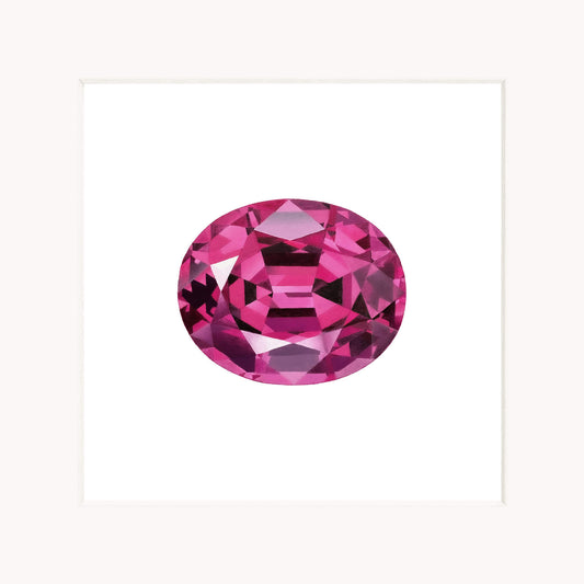 Pink gemstone on a white background