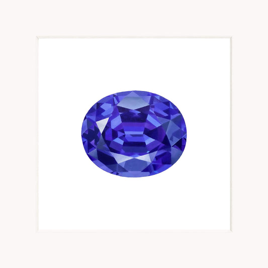 Faceted blue gemstone on a white background