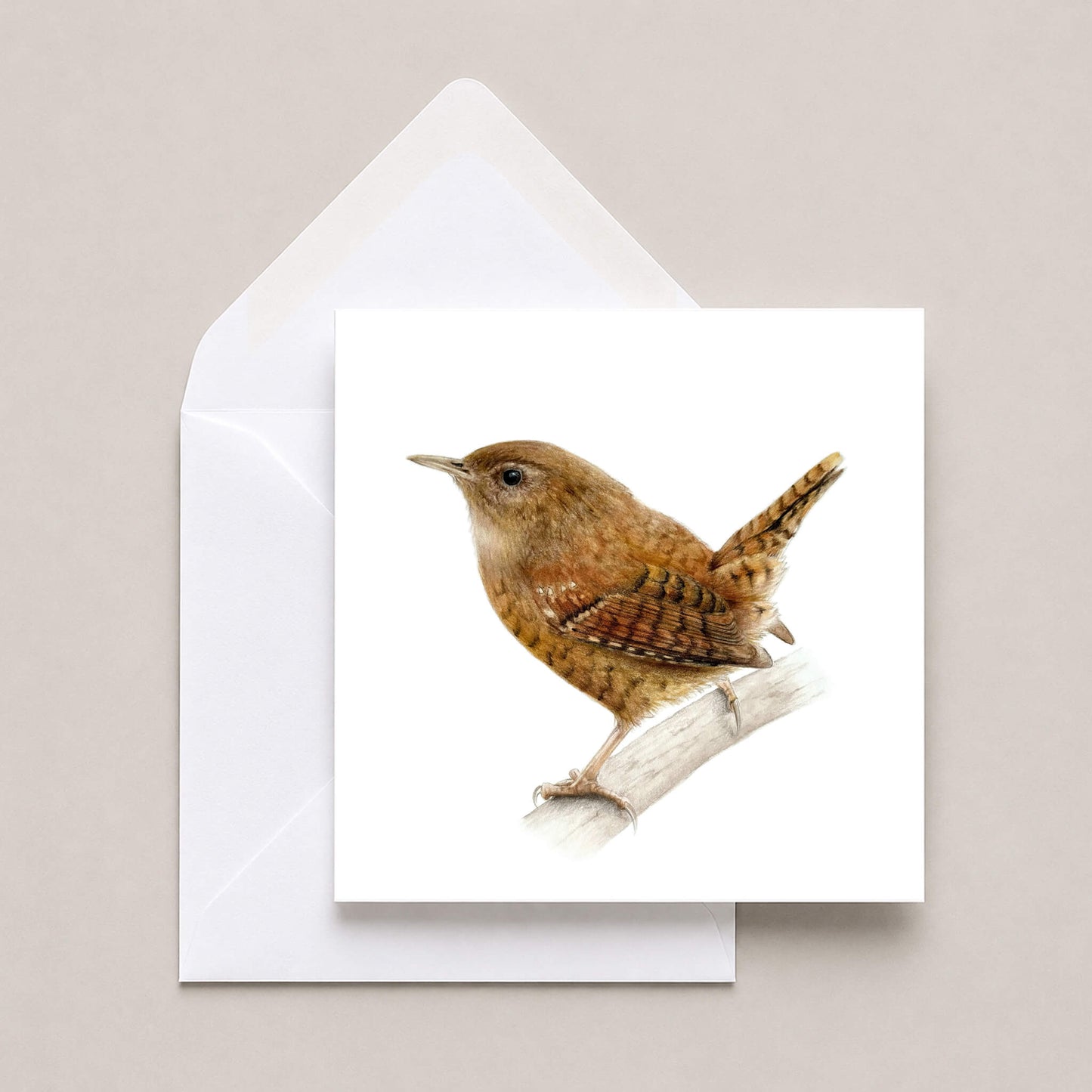 Greetings card featuring a wren with a white envelope on a neutral background