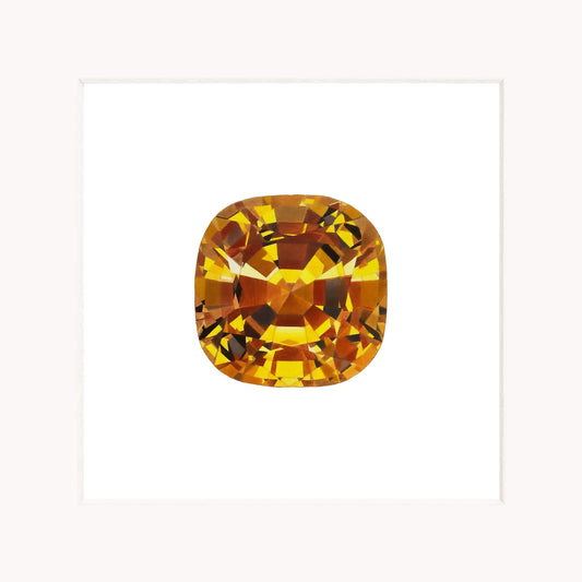 Orange gemstone on a white background