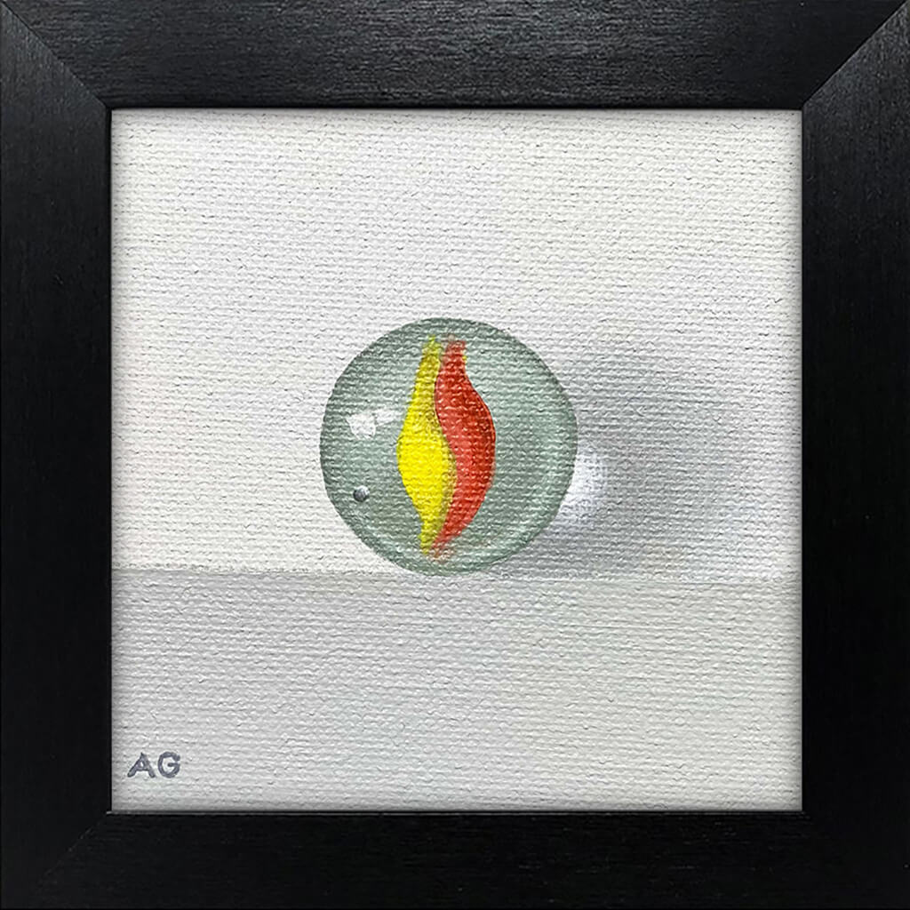 Framed Miniature painting of an orange and yellow glass toy marble by Amanda Gosse